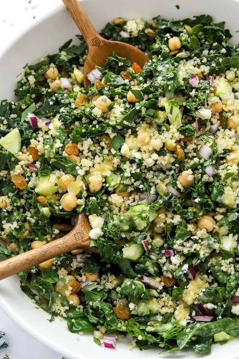 This kale quinoa salad is so amazing! It is made with hearty kale and fluffy quinoa mixed with crunchy pepitas, cucumber, onion, feta cheese, and fresh herbs. All drizzled with the incredibly delicious lemon dressing that makes it so tasty and flavorful. It’s hearty enough to enjoy as a healthy side dish or main meal. Best Quinoa Side Dishes, Kale Garbanzo Salad, Couscous Kale Salad, Quinoa Kale Recipes, Kale Side Dish Recipes, Kale Quinoa Salad Recipes, Quinoa Cucumber Salad, Baby Kale Recipes, Quinoa Kale Salad Recipes