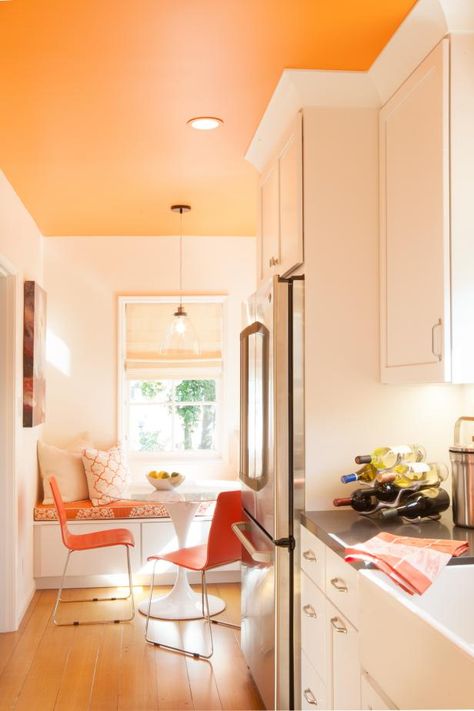 Orange And White Kitchen, Orange Accent Walls, Orange Rooms, 1920s House, Grey Countertops, Nordic Living Room, Orange Kitchen, Wallpaper Home Decor, Brown Kitchens