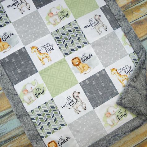 This safari blanket is a designer minky jungle baby blanket that can be personalized with a name. It has minky on both sides and would be perfect safari nursery baby gift for any safari themed nursery. The top side features a safari inspired theme--the perfect gender neutral baby blanket. The top is one solid piece of minky that has not been cut or quilted. It makes the perfect baby gift for a safari baby shower, and makes the cutest crib blanket!  Personalized Options  See listing photos and si Boys Baby Blanket, Safari Baby Nursery, Safari Baby Quilt, Jungle Quilt, Safari Quilt, Safari Baby Blanket, Gender Neutral Baby Quilt, Safari Nursery Boy, Jungle Safari Nursery