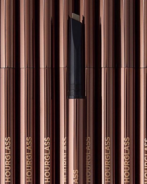 HOURGLASS Arch Brow Sculpting Pencil: A mechanical brow pencil with a distinctive triangular-shaped tip that combines the benefits of powder, pencil, and wax to effortlessly fill brows Pencil Product Photography, Brow Sculpting, Fashion Illustration Shoes, Pencil Photography, Arch Brows, Shade Finder, Brow Tutorial, Performance Makeup, Full Brows