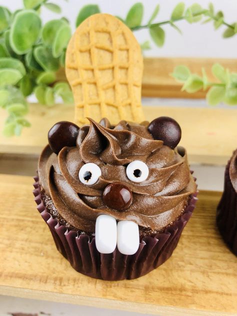 These adorable Beaver Cupcakes are rich and delectable cupcakes topped with a smooth and chocolatey frosting with a cute beaver face and nutter butter tail. Super cute for a kids birthday! #recipes #cupcakes #dessert Beaver Cake Ideas, Beaver Birthday Party, Fun Cupcake Designs, Tent Cupcakes, Brown Bear Cupcakes, Raccoon Cupcakes, Otter Cupcakes, Beaver Cupcakes, Beaver Party