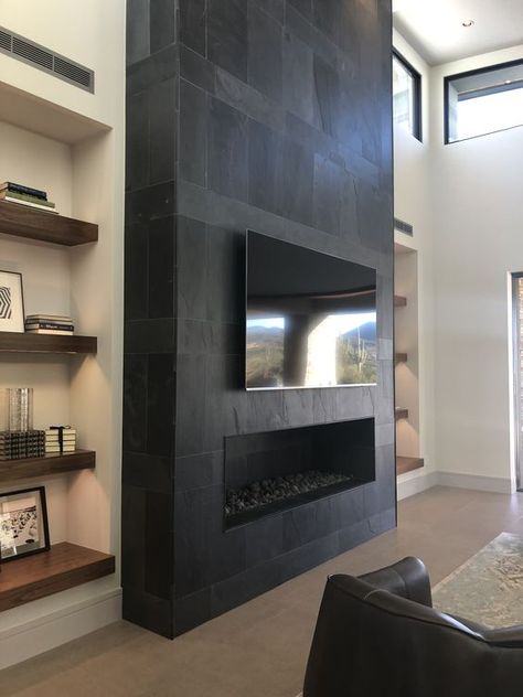 TV Above Fireplace: Should You Avoid It…or Do It? Basement Tv Wall Ideas Fire Places, 3 Sided Fireplace Mantel, Large Living Room With 2 Sofas, Fireplace And Media Wall, 2023 Kitchen Hood Trends, Black Tv Fireplace Wall, Paneled Study Walls, Large Bare Wall Ideas, Tiled Modern Fireplace