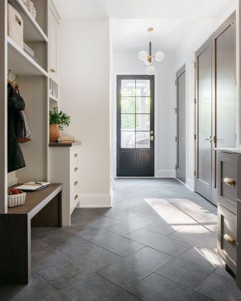 Atlas Concorde USA on Instagram: "Show us a prettier mudroom... we'll wait... 😉 The BIG REVEAL of @MHouseDevlopment's mudroom is here, and we could look at this view all day. Our Cove Storm large-format tile sets a durable and timeless foundation for this stunning space that says "welcome home." Thank you to M House Development for choosing #AtlasConcordeUSA! Photo by @margaretrajic" Big Mudroom, Mudroom Tile, House Development, Affordable Lighting, Atlas Concorde, Recessed Ceiling Lights, Large Format Tile, Big Reveal, Glass Globes