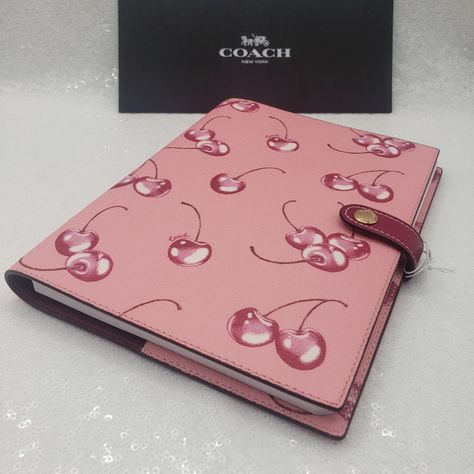 Coach Notebook With Cherry Print Color: Pink & Dark Pink Printed Coated Canvas And Smooth Leather Snap Closure Measurements: 6.75" L X 8.5" H Refillable With The Same Size Notebook Measuring 5.75" X 8.75" A Fun Pop Of Pink Color Sweet Cherry Print, Great For Journaling Or Doodling Comes In Original Coach Packaging Please Refer To Photos & Thank You For Visiting My Closet Coach Notebook, Refillable Journal, Stationary Supplies, Dream Aesthetic, Office Notebook, Tablet Cases, Pink Dark, Sweet Cherries, Cherry Print