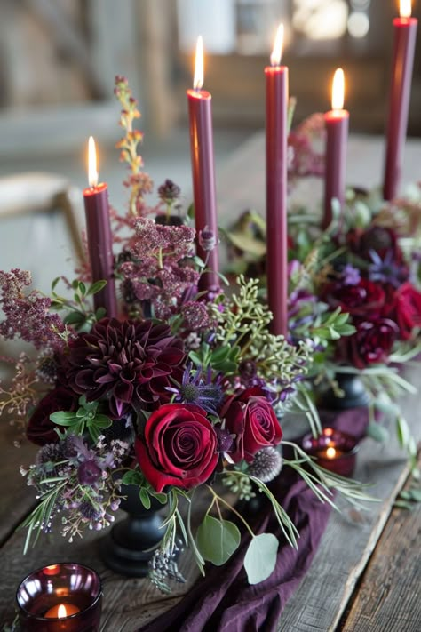 Moody wedding centerpieces feature deep colors and rich textures for a dramatic effect. Get inspired here. Moody Mauve Wedding, Dark Purple And Burgundy Wedding, Deep Color Wedding, Goth Wedding Centerpieces, Centrepieces For Weddings, Moody Wedding Centerpieces, Moody Wedding Cakes, Jewel Tone Party, Driftwood Wedding Centerpieces