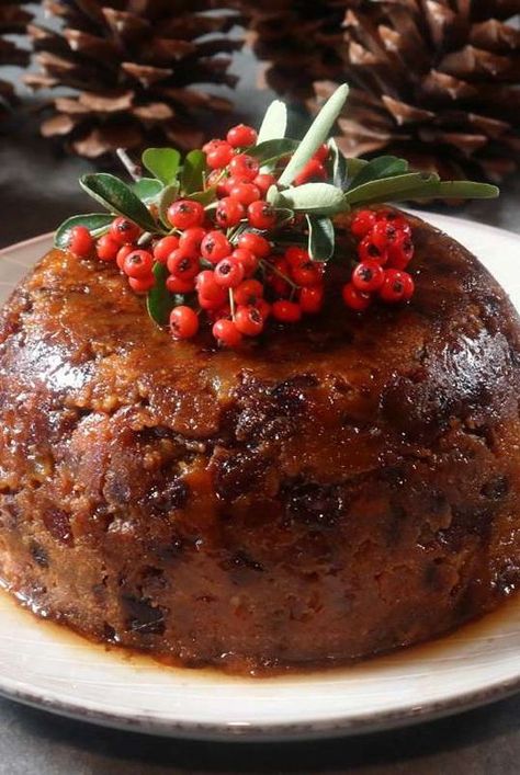 This steamed Christmas pudding is moist, sticky, and deliciously fruity with a great texture — a spectacular British Christmas dessert fit for a queen! British Bread Pudding, English Pudding British Desserts, Hard Sauce For Christmas Pudding, Christmas Pudding Recipes Easy, Mary Berry Recipes Christmas, Christmas Food And Drinks, British Christmas Recipes, British Christmas Food, Queens Pudding