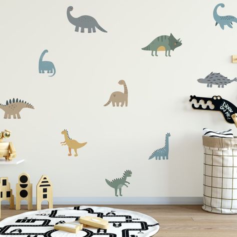 Transform your child’s space into a dino-mite wonderland with these pastel dinosaur decals! 🦖✨ @rockymountaindecals || jurassic decals Dinosaur Theme Room, Rocky Mountain Decals, Dinosaur Decals, Dinosaur Wall Decals, Ivy Cottage, Cottage Wallpaper, Wall Stickers Animals, Mountain Decal, Nursery Stickers