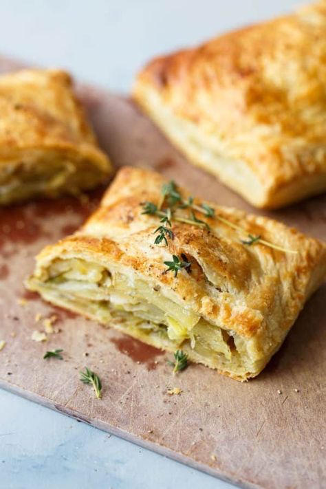 Potato Leek Cornish Pastry - a delicious classic English pastry made easy with store-bought puff pastry. The potato leek filling is combined with fresh thyme, sharp cheddar cheese, and cream to create a comforting, indulgent, and delicious main course! #leek #potato #pastry #thyme #pasty #abeautifulplate Cornish Pastry, Cornish Pasty, Pasties Recipes, Cornish Pasties, Creamed Leeks, Potato Leek, Simple Green Salad, Veggie Food, Frozen Puff Pastry