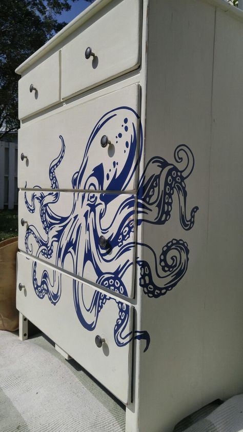 Solid Wood Dresser painted in Annie Sloan Old White, distressed, wrapped with a large royal blue octopus decal and finished in soft wax.  Also given new brushed nickel drawer pulls. Dresser Painting Ideas Creative Drawers, Painting Wood Dresser, Dresser Painting Ideas Creative, Nautical Dresser, Dresser Inspiration, Annie Sloan Old White, Dresser Painted, Blue Octopus, Solid Wood Dresser