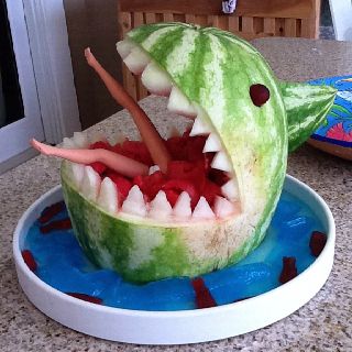 Shark watermelon! Love the added barbie touch! Megalodon Party, Shark Watermelon, Watermelon Shark, Shark Week Party, Fruit Birthday Cake, Spooky Dinner, Ocean Birthday Party, Birthday Party Games For Kids, Watermelon Carving