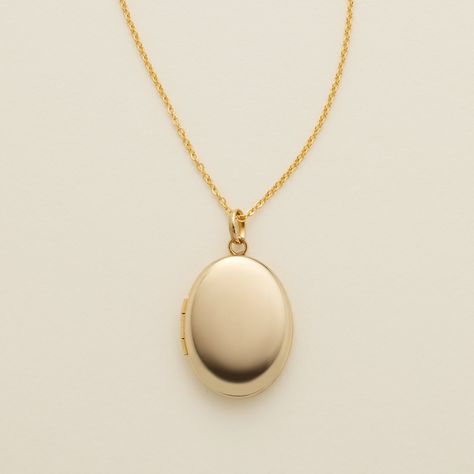 Oval Locket Necklace Luxury Minimalist Locket Jewelry, Cheap Adjustable Gold Locket Necklace, Cheap Gold Engraved Locket Necklace, Cheap Gold Oval Necklace, Oval Locket Necklace For Anniversary, Cheap Gold Locket Jewelry, Keepsake Necklace Lockets, Cheap Round Pendant Locket Jewelry, Affordable Elegant Locket Necklace