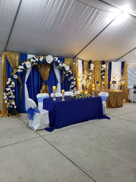 Quinceanera Royal Blue Decoration, Navy Blue Quinceanera Backdrop, Royal Blue And Gold Backdrop Ideas, Royal Blue Photo Backdrop, Navy Blue And Gold Wedding Backdrop, Royalty Table Decorations, Royal Blue White And Gold Party, Royal Blue And Gold Quinceanera Main Table, Royal Blue And Gold Decorations