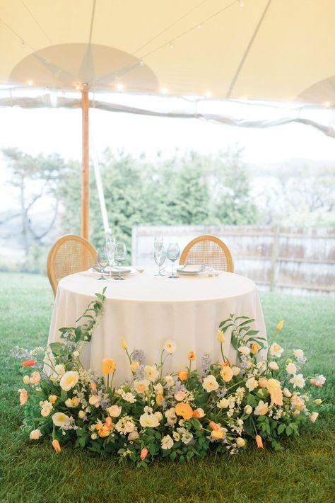 Flowers In Front Of Sweetheart Table, Sweetheart Table Outdoor, Spring Sweetheart Table, Spring Wedding Sweetheart Table, Sweet Heart Table Florals, Orange Sweetheart Table, Wildflower Sweetheart Table, Colorful Sweetheart Table, Sweetheart Table Flower Arrangements