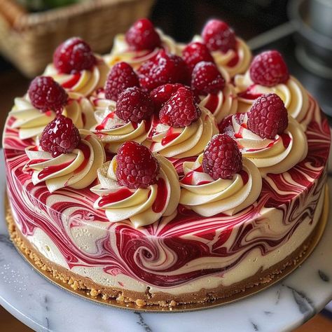 Elegant White Chocolate Raspberry Swirl Cheesecake – Delectable Recipe White Chocolate Raspberry Swirl Cheesecake, Cakes That Arent Cakes, Cheesecake White Chocolate Raspberry, New Years Breakfast Ideas Kids, Almond Raspberry Swirl Cake, Desserts And Sweets, Decorating A Cheesecake Ideas, Raspberry Cake Ideas, 3 Layer Cheesecake