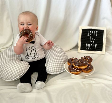 6 month baby photos Half Birthday Donut Photoshoot, 6 Month Donut Pictures, Happy Half Dozen 6 Months, 6 Month Smash Cake, 6 Month Baby Photo Shoot, Half A Year Birthday Baby 6 Months, Half Birthday Ideas For Boys 6 Months, Half Dozen Photo Shoot, Baby Boy Half Birthday Ideas