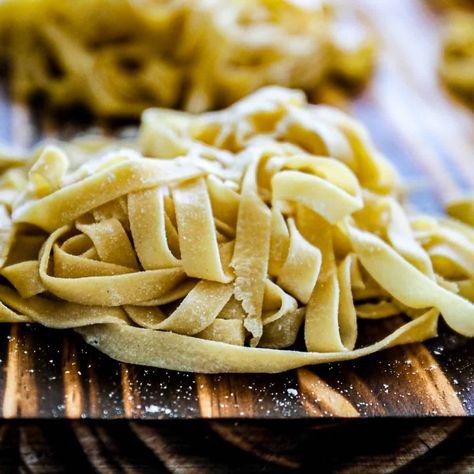 Make this easy homemade pasta recipe with only 4 ingredients. Create homemade Fettuccine, Linguine, or Spaghetti noodles with any tools… Make pasta by hand, a pasta machine, a KitchenAid mixer, or in a food processor with this guide. Let’s mangia! | sipbitego.com Recipes With Fettuccine Noodles, Homemade Fettuccine Noodles, Homemade Fettuccine, Linguini Pasta, Easy Homemade Pasta, Braised Chicken Breast, Homemade Pasta Recipe, Fettuccine Noodles, Chewy Bread