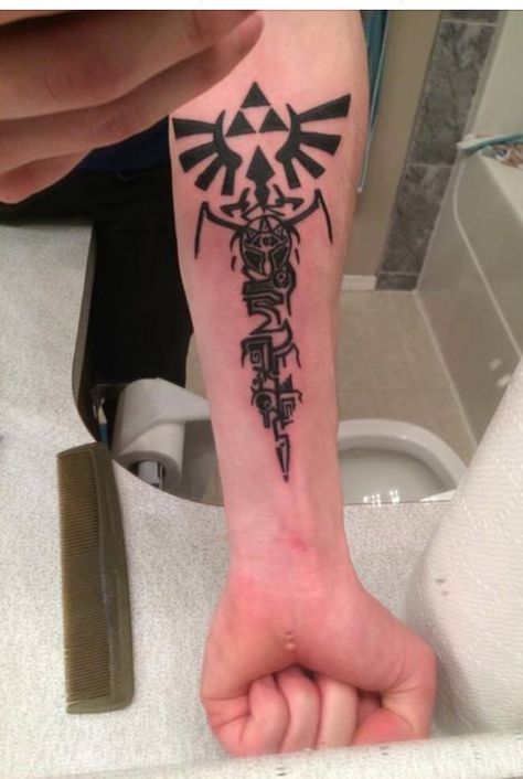 Zelda tattoo Zelda Forearm Tattoo, Video Game Tattoo Ideas, Game Tattoo Ideas, Playstation Tattoo, Forearm Cover Up Tattoos, Game Tattoo, Video Game Tattoos, Zelda Tattoo, Gamer Tattoos