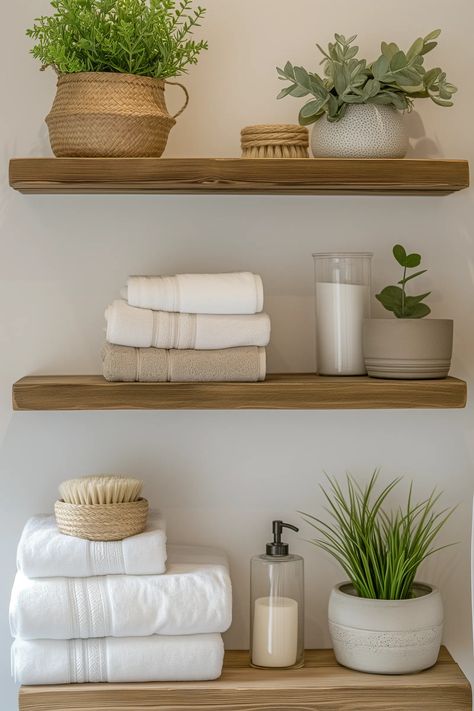 17 Creative Small Bathroom Shelf Ideas That Look Gorgeous Bathroom With Shelves Ideas, Small Bathroom Ideas Above Toilet, Modern Bathroom Shelving Ideas, Over The Toilet Shelves Decor, Floating Shelves Decor Bathroom, Small Bathroom With Shelves, Over Toilet Shelf Ideas, Bathroom Wall Shelving Ideas, Bathroom Shelves Styling