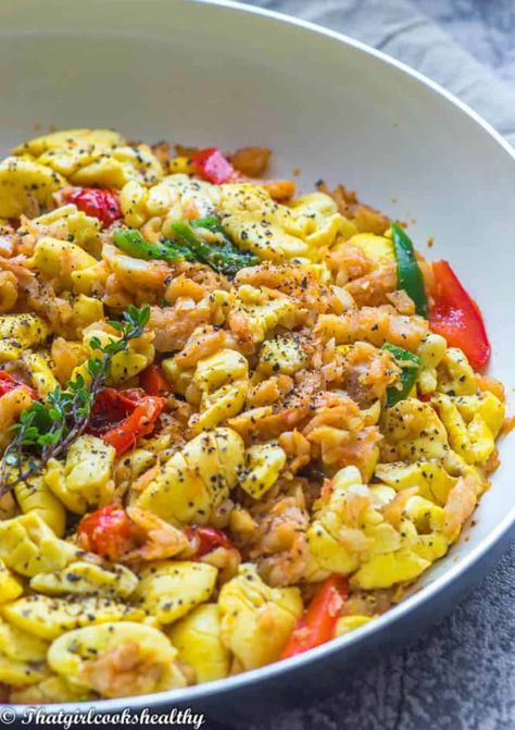 This delicious Ackee and Saltfish recipe is Jamaica's national dish made in one-pan for a satisfying, amazing, flavoursome meal! #ackeeandsaltfish #Jamaicannationaldish #breakfast Ackee And Saltfish Recipe, Ackee Fruit, Saltfish And Ackee, Jamaican Banana Fritters, Ackee And Saltfish, Baked Plantains, Jamaica Food, Banana Fritters, Jamaican Dishes