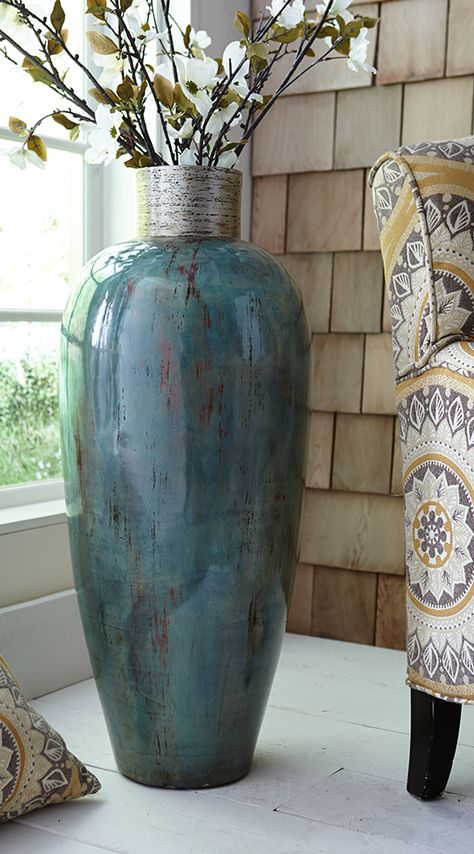 It’s okay to put baby blue in a corner. Let Gallery Home Staging help you put the right pop of color to add interest in your home. www.thegalleryhomestaging.com Vases Decor Living Room, White Vase Decor, Floor Vase Fillers, Huge Vase, Vasos Vintage, Floor Vase Decor, Scandinavian Vases, Vases Centerpieces, Large Floor Vase