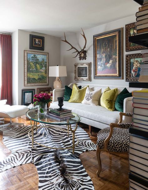 M. James Design Group | Creating a mood for every home Living Room With Leopard Accents, Zebra Rugs In Living Room, Zebra Print Interior Design, Mixing Animal Prints Decor, Eclectic Classic Living Room, Zebra Rug Living Room, Colorful Bungalow, Maximalist Inspiration, Leopard Living Room