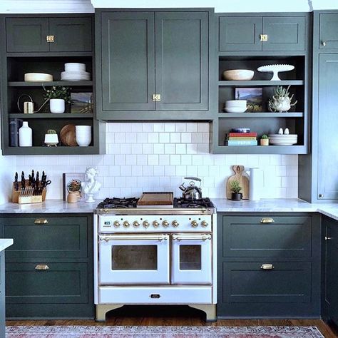 We are so in love with our 1915 historic kitchen remodel in the heart of Fairmount in Ft Worth. Rich green cabinets, a custom Italian range, and built in bench seating make this space irresistibly charming! 😊 . . . . .  #mycovetedhome #fearlesshome Kitchen Restoration, Classic Kitchen Cabinets, Historic Kitchen, Top Kitchen Trends, Dark Green Kitchen, Kitchen Cabinets Pictures, Kitchen Updates, Green Kitchen Cabinets, Basic Kitchen