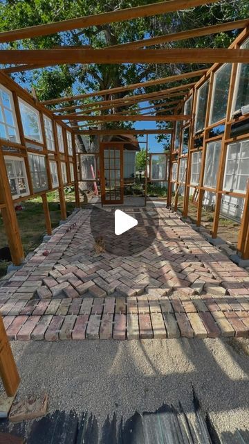 Lily & Rose on Instagram: "Been a minute since I worked on the greenhouse due to planting season and installing a drip system. But obsessed with this brick! Next up… brick and mortaring 😬   #lilyandrose #sharejoy #greenhouse #diygreenhouse #backyardblooms #flowerfarmer #brick #brickbybrick" Greenhouse Paver Floor, Brick Greenhouse Floor, Diy With Bricks, Brick Floor Greenhouse, Greenhouse Plans Old Windows, Greenhouse Floor Ideas, Brick Greenhouse, Greenhouse Landscaping, Rooftop Greenhouse