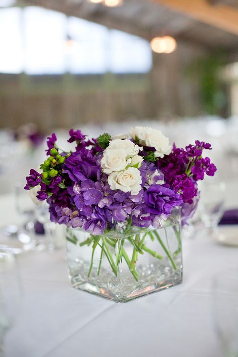 Virgo Party, Wedding Colors 2025, Ceremony Centerpieces, April Wedding Colors, Violet Bridesmaid Dresses, Wedding Arch Ceremony, Graduation Banquet, Purple Flower Centerpieces, White Wedding Table Decor