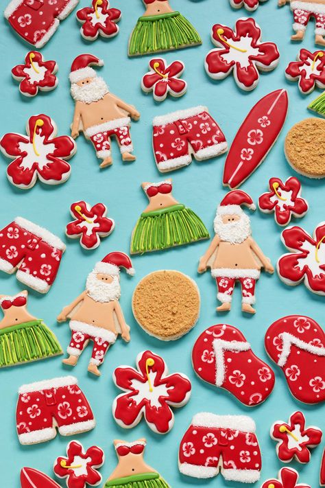 How to Make Mele Kalikimaka Cookies with a Video Tutorial via www.thebearfootbaker.com Cookie Paint, Santa Treats, Aloha Christmas, Christmas In July Decorations, Hawaiian Santa, Fun Christmas Party Ideas, Christmas In July Party, Christmas Party Ideas For Teens, Hot Christmas