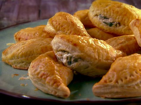 Poblano Cream Cheese Empanadas from FoodNetwork.com  Ingredients        4 ounces cream cheese, at room temperature      2 poblano chiles, charred, peeled, stemmed, seeded and cut into 1/2-inch cubes      1 (1-pound) package frozen puff pastry, thawed      Flour, for dusting      1 large egg, beaten      1/2 teaspoon salt      1/2 teaspoon freshly ground black pepper Poblano Empanadas, Cream Cheese Empanadas, Cheese Empanadas Recipe, Cheese Empanadas, Cream Cheese Wontons, Empanada Recipe, Party Platter, Empanadas Recipe, Frozen Puff Pastry