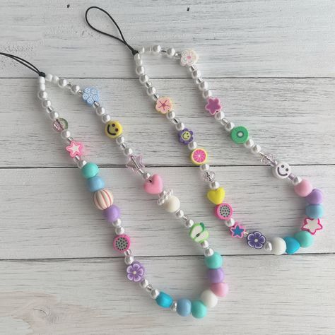 Excited to share this item from my #etsy shop: Pastel Phone Charm, Peal Beaded Phone Chain, cell phone accessories, phone strap, kpop jewelry #pink #rainbow #y2kphonecharm #beadedphonechain #pastelcharms #pinkphonecharm #colorfulphonestrap #90sfashion #phoneaccessories Phone Strap Kpop, Kpop Bracelet, Kpop Jewelry, Pastel Phone, قلادات متدلية, Pastel Beads, Visual Board, Bead Charms Diy, Diy Bracelets Patterns