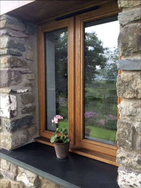 Stained timber flush casement windows Natural Wood Windows, Stone Window Sill Exterior, Oak Window Sill, Stone Window Sill, Wooden Casement Windows, Deep Window Sill, Exterior Window Sill, Timber Window Frames, Flush Casement Windows