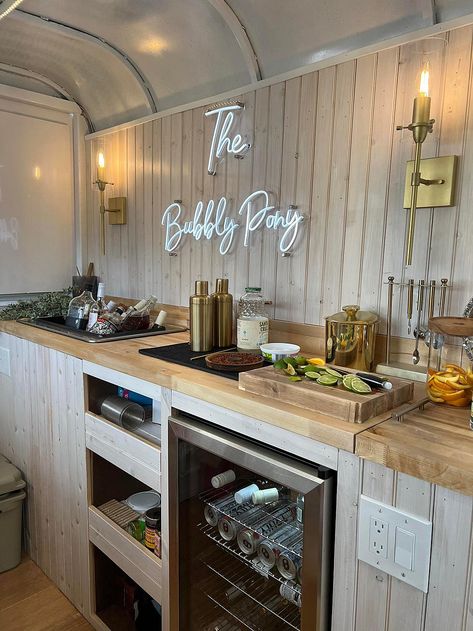 Bubbly Pony Traveling Luxury Bar Horse Trailer Bar Interior Ideas, Trailer Bar Interior, Horse Trailer Coffee Shop, Drink Trailer Ideas, Horse Trailer Bar Interior, Horse Trailer Interior Remodel, Traveling Luxury, Float Bar, Horsebox Bar