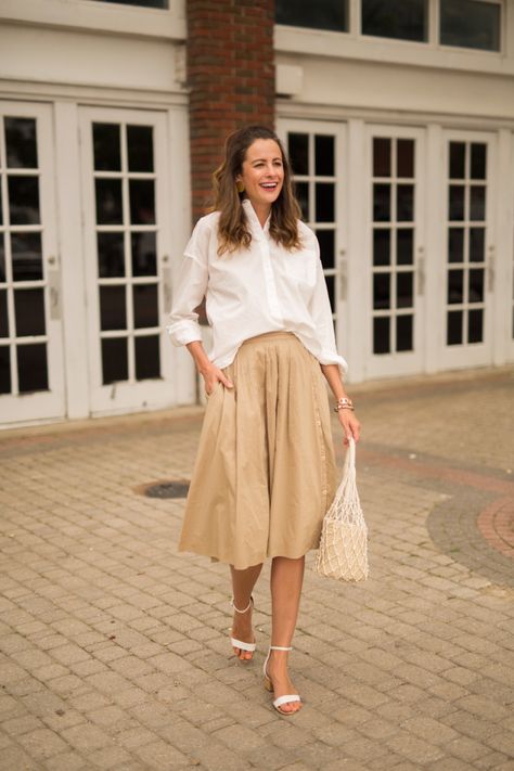 themilleraffect.com wearing a white alex mill button up and khaki midi skirt Beige Midi Skirt Outfit Summer, Khaki Midi Skirt, Cream Midi Skirt For Summer, Casual Cream Midi Skirt, White Khaki Outfit, Cream Midi Skirt For Day Out, Khaki And White Outfits, White And Khaki Outfit, Khaki Skirt Outfit