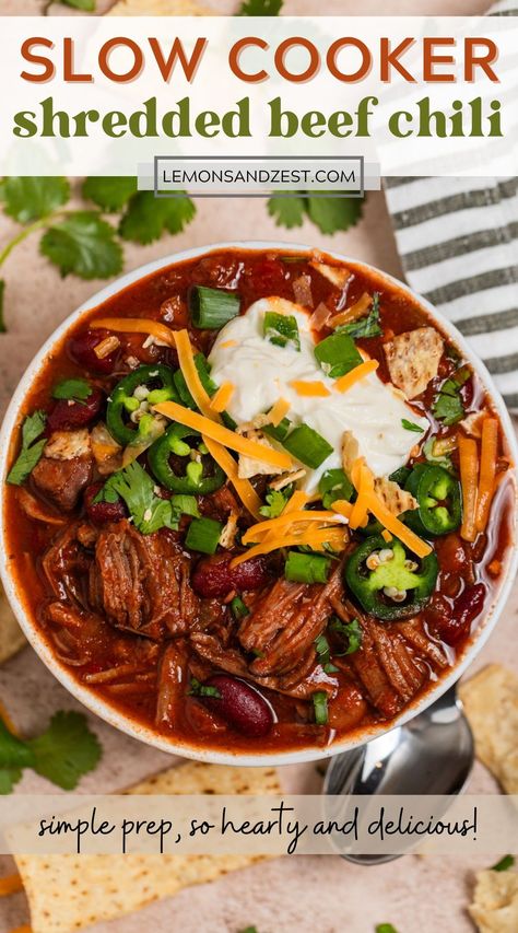 If you love tender, pull apart, melt in your mouth beef, then this Slow Cooker Shredded Beef Chili recipe is going to be a new favorite! Warm and cozy chili spices flavor this beef that falls apart and will warm you up with each bite. Beans and veggies added to make this a complete meal in a bowl--ready for lots of toppings! Chili Recipe Crockpot Chuck Roast, Shredded Beef Chili Crockpot, Leftover Roast Beef Chili, Chili With Shredded Beef, Chili With Chuck Roast Crock Pot, Chili Recipe With Beef Chunks, Crockpot Shredded Beef Recipes, Chuck Roast Chili Recipes, Steak Chili Recipe Crockpot