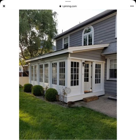 Garage Sunroom Conversion, Farmhouse Sunroom Exterior, Deck Sunroom Enclosed Porches, Exterior Sunroom Addition, Front Room Addition To House, Sunroom Over Garage, Colonial Sunroom Addition, Sunroom Dining Area, Bungalow With Sunroom