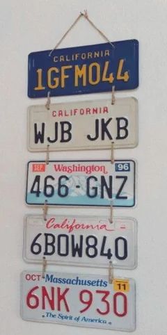 How to attach car license plates on a garage wall ? How To Display License Plates, License Plate Display, License Plate Ideas Decor, License Plate Display Ideas, Display License Plates, How To Hang License Plates On The Wall, License Plate Garage Decor, Car Plates Decoration, Framed License Plates