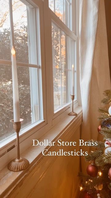 Candles And Wreaths In Windows, Christmas Brass Candlesticks, Candles In Windows Christmas, Diy Christmas Window, Christmas Window Candles, Pottery Barn Hacks, Black Candlesticks, Window Wreath, Window Candles