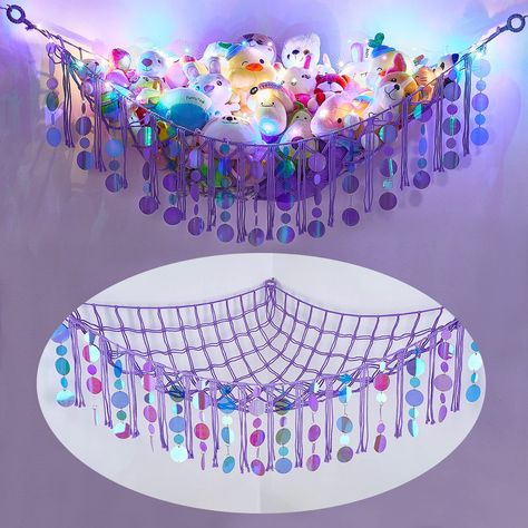 PRICES MAY VARY. Glittery Stuffed Animals Holder - Decorated with translucent sequins around the front of toy hammock, the mirror sequins can reflect a variety of colors which changes according to differnt light or position, and glittered in the sunshine. Unique Design - Stuffed animals organizer come with a string of colored LED lights (requires 2pcs AA batteries, NOT including) which can be used as a night-light. Add a warm atmosphere to your home. The sequins will shine in the daytime, the LE Stuffed Animals Storage, Stuffed Animal Holder, Stuffed Animal Hammock, Hammock Netting, Toy Storage Organizer, Mermaid Room, Pet Organization, Toy Storage Organization, Playroom Organization