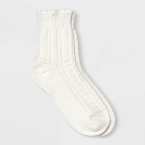 Keep your feet warm with the Women's Scalloped Edge Pointelle Supersoft Short Crew Boot Socks - Universal Thread™ 4-10. These soft socks are made from blended midweight fabric that ensure maximum comfort and warmth. With ribbed knit cuffs and a scalloped edge design, they provide a secure, snug fit that stays in place all day. Perfect for lounging at home or for pairing with boots, these essential socks are a seasonless staple for every wardrobe. Universal Thread™: Found exclusively at Target. Target Christmas Socks, Cute Winter Socks, Fatface Socks, Cute White Socks, Saving List, Socks Png, Essential Socks, White Crew Socks, Sock Collection