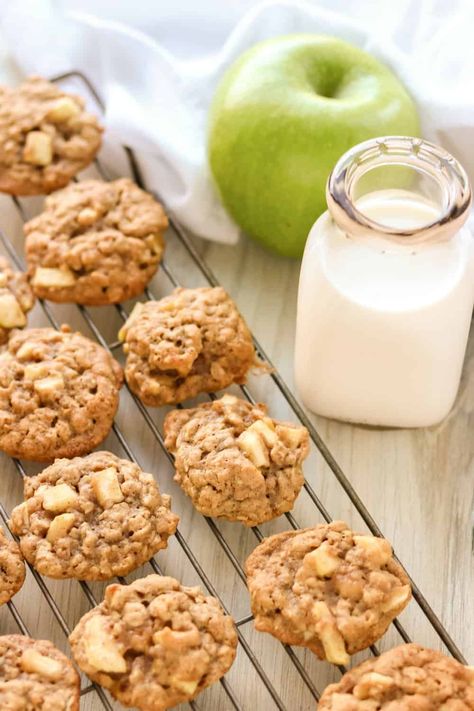 Apple Cinnamon Oatmeal Cookies are chewy, sweet cookies full of fall flavor. Lightly spiced with cinnamon and nutmeg, these oatmeal cookies have real apple bits in every bite! Apple Cinnamon Oatmeal Cookies, Coconut Cooler, Cherry Oatmeal Cookies, Cinnamon Oatmeal Cookies, Caramel Apple Cheesecake Bars, Apple Oatmeal Cookies, Apple Cinnamon Oatmeal, Caramel Apple Cheesecake, Apple And Peanut Butter