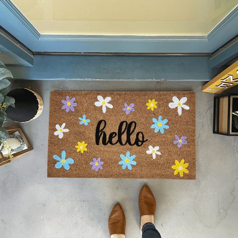 "Our bright flowers doormat is the perfect way to create an inviting and charming spring entry way or makes a great housewarming gift! Our outdoor doormats are the perfect accent to your spring decor and are a unique way to personalize your front porch decor. ✦Production time is 5-7 business days prior to shipping. Shipping is UPS Ground or USPS service. No PO Boxes, please. ✦This listing is for the hand painted doormat only, you can pair our doormat with our buffalo check rug available here: ht Diy Rug Painting, Buffalo Check Rug, Outdoor Rug Diy, Painted Doormat, Outdoor Doormats, Spring Doormats, Door Mat Outdoor, Door Mat Diy, Spring Porch Decor