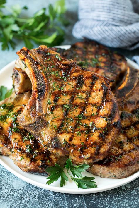 Grilled Pork Chops | Pork Chop Marinade #porkchops #grilling #pork #marinade #dinner #dinneratthezoo Pork Chops Grilled, Best Pork Chop Marinade, Marinated Pork Chops Grilled, Pork Chop Marinade Recipes, Best Grilled Pork Chops, Grilled Pork Chops Marinade, Pork Chop Recipes Grilled, Pork Chop Seasoning, Pork Chop Marinade