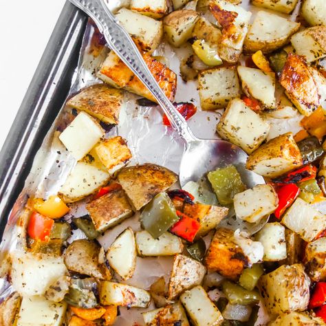 Roasted Potatoes, Peppers, and Onions. An easy and healthy side dish recipe packed with flavor, nutrients, and color. Minimal oil is added to keep fat and calories down! Roasted Breakfast Potatoes, The Defined Dish, Potato Breakfast Recipes, Defined Dish, Whole 30 Breakfast, Breakfast Potatoes, Healthy Side Dishes, Whole 30 Recipes, Roasted Potatoes