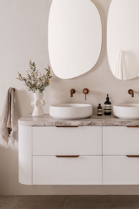 Meet Thirroul, our new Twin All-Drawer vanity with curved feature ends. By adding double the storage, this new design combines elegant style with practical functionality⁠ to create the perfect vanity for your coastal-inspired bathroom.⁠ Available now in 4 thermolaminated cabinet finishes: Ultra White, Coastal Oak, Prime Oak & Florentine Walnu Ensuite Vanity, Coastal Ceiling Fan, Double Shower Heads, Wall Hung Bathroom Vanities, Timber Vanity, Curved Wall, Black Kitchen Sink, White Kitchen Sink, Architectural Designer