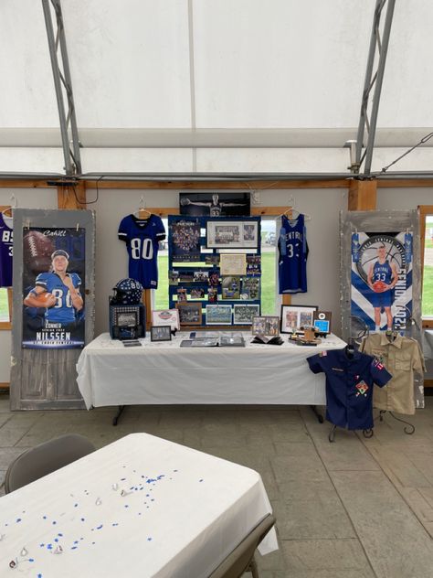 Graduation Display Table Ideas, Middle School Sports Banquet, Signing Day Table Ideas College, College Table Display, Graduation Sports Display, Signing Day Table College Lacrosse, Boy Grad Party, High School Senior Sports Night, Graduation Table Ideas For Boys