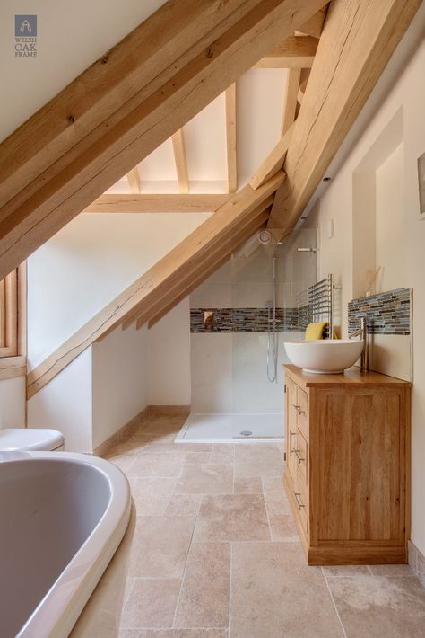 The Hobbs or WOF 212 is a stunning example of how a traditional oak frame can suit a more modern design. ⁠ ⁠ With traditional elements in the oak rafters and contemporary in the open plan downstairs layout it is a fine balance between the two styles. ⁠ Open Plan Downstairs, Cottage Bathroom Ideas, Warm Bathroom, Oak Frame House, Modern Family Home, Oak Framed Buildings, Ensuite Shower Room, Oak Bathroom, Attic Bathroom