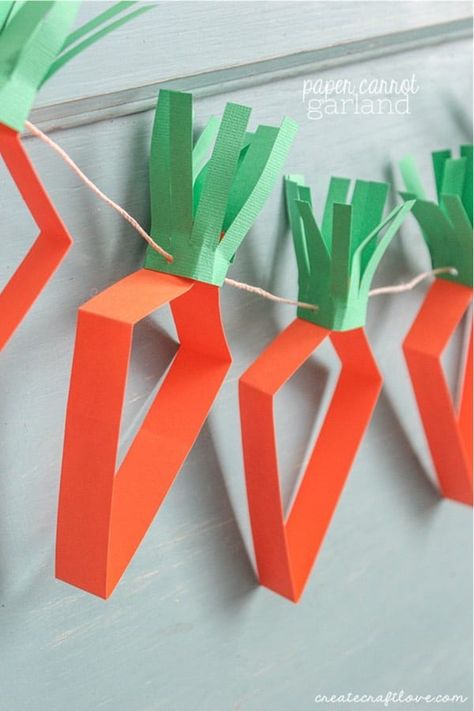 If you have a stack of construction paper just waiting to be turned into a fun craft for the kids, check out these awesome construction paper craft ideas and tutorials for inspiration! Carrot Crafts, Diy Paper Crafts Ideas, Easter Diy Kids, Cafeteria Decor, Carrot Garland, Paper Carrots, Easter Paper Crafts, Paper Flower Wreaths, Construction Paper Crafts