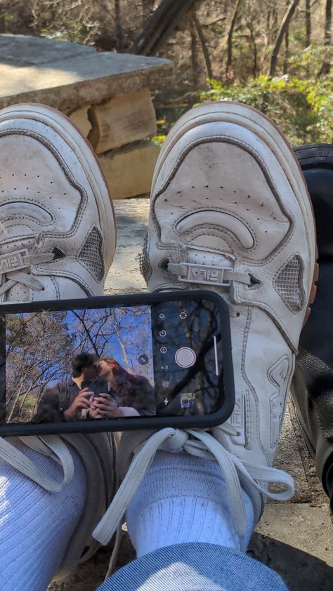 Couple, boyfriend, girlfriend, valentine's, shoes, two phones, taking picture of selfie camera