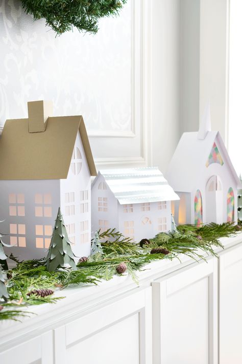 How to make winter village houses from cardstock with free SVG cut files and PDF printables. Includes four designs with trees and a step by step tutorial. Card Stock Christmas Crafts, Card Stock Crafts, Diy Christmas Village Houses, Classy Crafts, Box Templates Printable Free, 3d Paper Houses, Snowy Town, Art Caddy, Village Tree